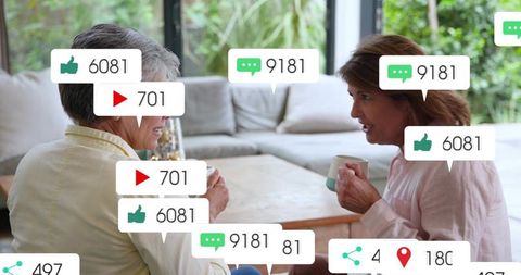 Mature women chatting over coffee with social media notification overlays
