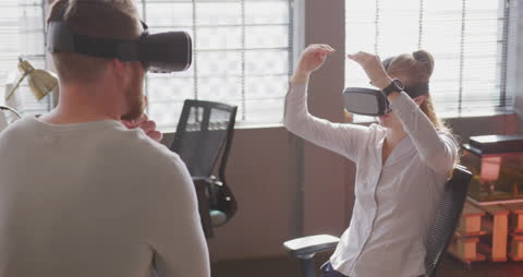 Young Professionals Exploring Virtual Reality in Modern Office
