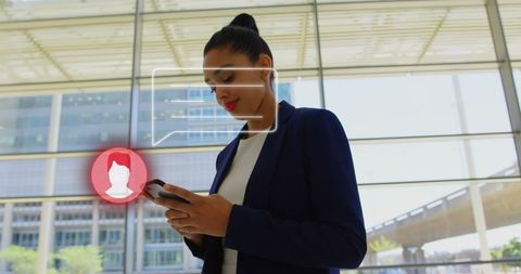 Businesswoman Engaging with Digital Network Icons in Modern Office