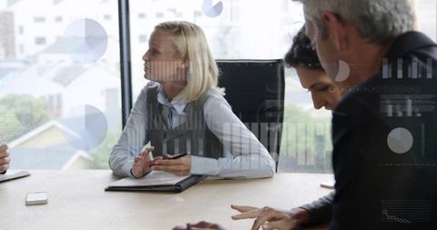 Blonde woman leading business meeting with colleagues and data overlays in daylight