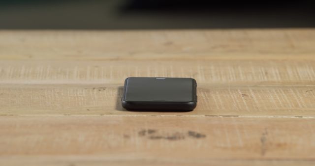 Stylish Black Smartwatch on Wooden Table Surface - Download Free Stock Images Pikwizard.com