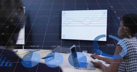 business professionals analyzing financial data projections - Download Free Stock Images Pikwizard.com
