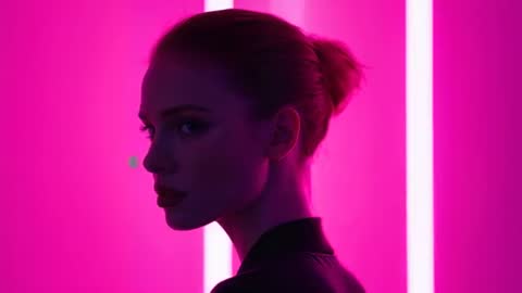 Elegant Model in Futuristic Magenta Scene with LED Lighting