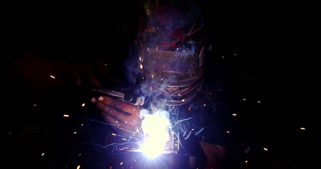 Welder in Protective Gear Using Welding Torch - Download Free Stock Images Pikwizard.com