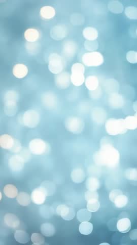 Shimmering Blue Bokeh Lights Moving Vertical Background for Social Media Videos and Intros
