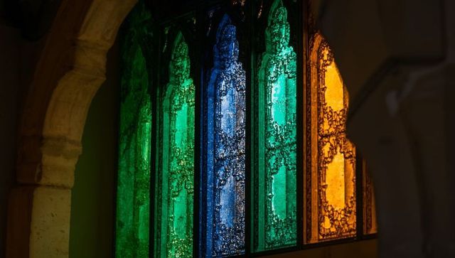 Stained Glass Windows Illuminating Classic Chapel Interior
