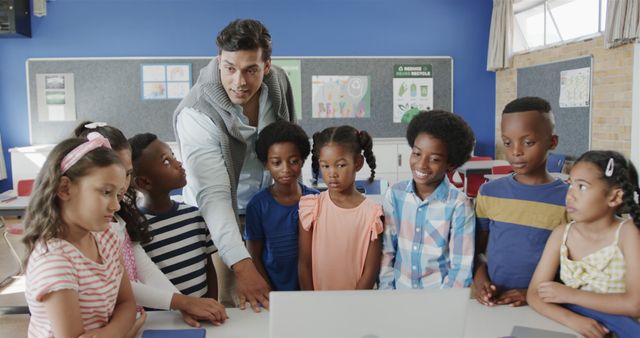 Teacher Guiding Curious Children in Classroom - Download Free Stock Images Pikwizard.com