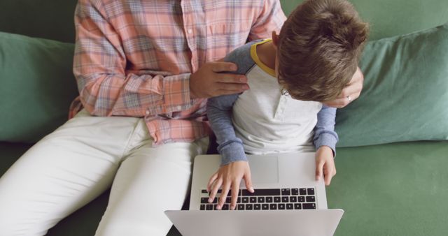 Father Supporting Son Learning on Laptop at Home - Download Free Stock Images Pikwizard.com