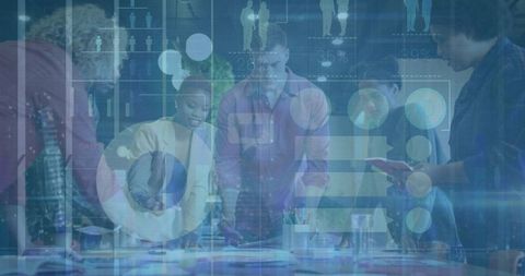 Diverse team analyzing digital around conference table