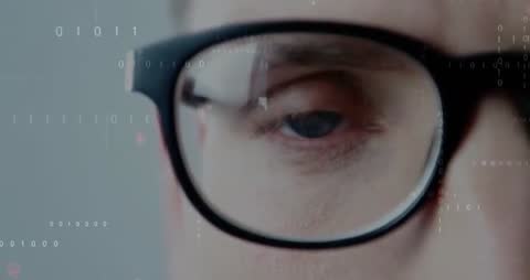 Tech Innovator Analyzing Data with Futuristic Overlay