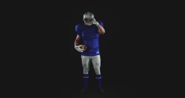 American Football Player in Blue Uniform Ready for Action - Download Free Stock Images Pikwizard.com