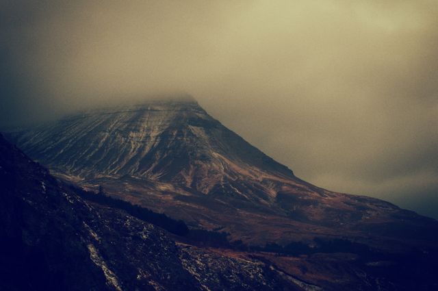Misty Mountain peak with Fog and Dramatic Sky - Download Free Stock Images Pikwizard.com