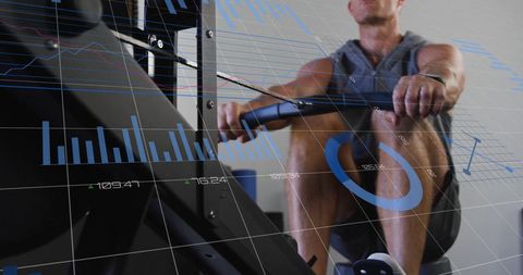 man using rowing machine with fitness data visualizations - Download Free Stock Images Pikwizard.com