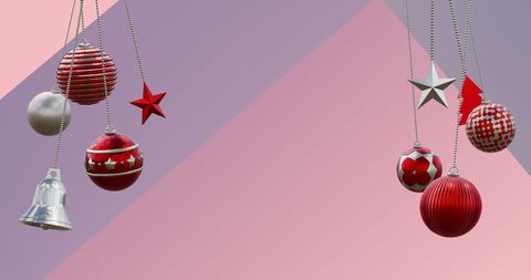 Hanging Christmas Ornaments on Vibrant Geometric Background