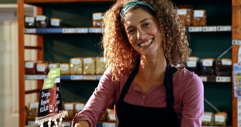 Friendly Small Business Owner in Retail Setting - Download Free Stock Images Pikwizard.com