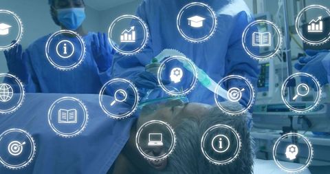 Surgical team ventilating patient under anesthesia in operating room with data overlays
