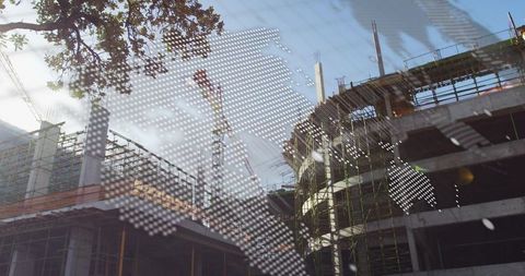 Modern construction with overlay of world map highlighting urban development