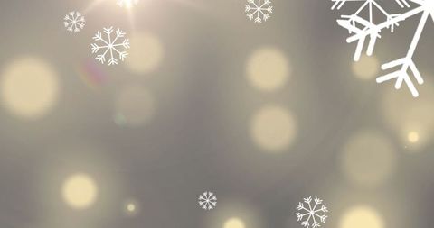 Falling Snowflakes and Glowing Bokeh on Yellow Background