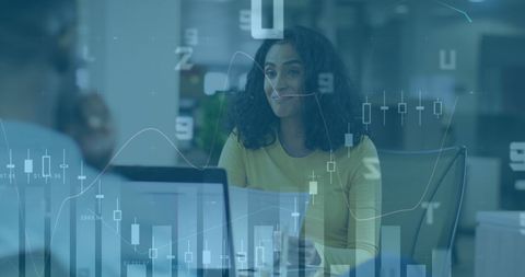 Smiling Businesswoman with Financial Graphics Overlay in Office - Download Free Stock Images Pikwizard.com