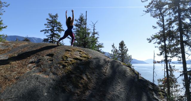Woman Practicing Yoga on Mountain Top Overlooking Ocean - Download Free Stock Images Pikwizard.com