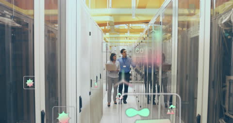 Digital Engineers Analyzing Server Data in Modern Data Center