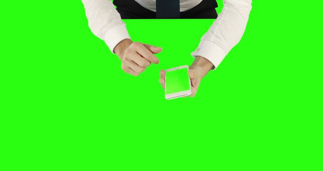 Businessman Presenting Smartphone with Green Screen - Download Free Stock Images Pikwizard.com