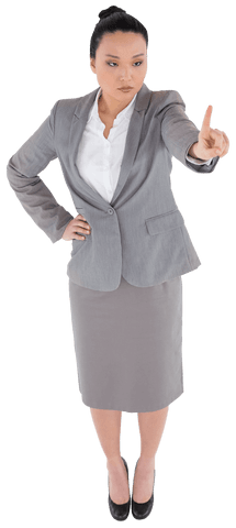 Serious asian businesswoman pointing with authority transparent background