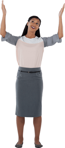 Confident Businesswoman with Arms Raised Displaying Triumph