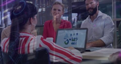 Team Analyzing Data Insights in Boardroom Meeting