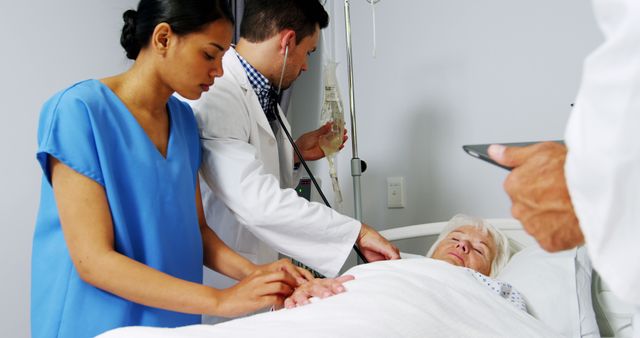 Nurse and Doctor Treating Elderly Patient in Hospital Room - Download Free Stock Images Pikwizard.com