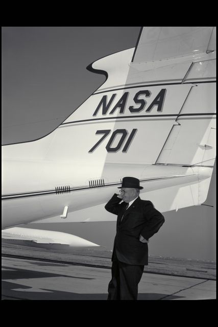 Smithy J. DeFrance (Ames Director) at tail of Ames Lear Jet (NASA-701)