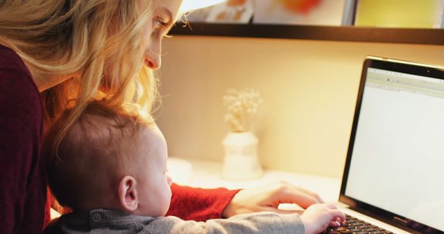 Mother Working from Home with Baby on Laptop - Download Free Stock Images Pikwizard.com