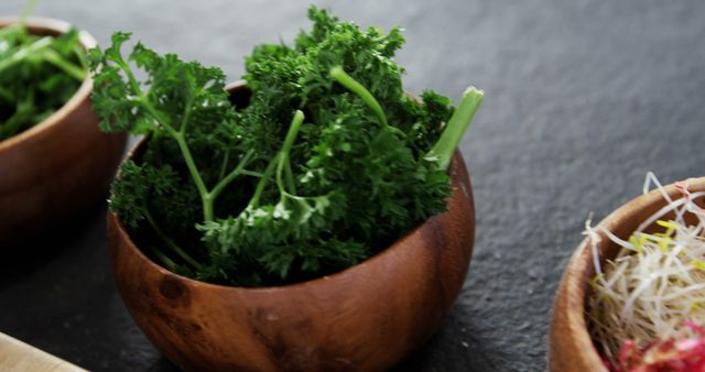 Fresh Parsley in Wooden Bowl on Dark Stone Table - Download Free Stock Images Pikwizard.com