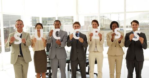 Diverse Business Team Celebrating Success Together