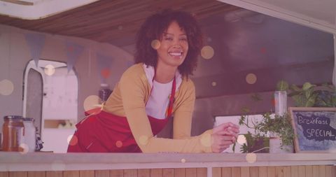Smiling Waitress at Food Truck Serving Breakfast Special