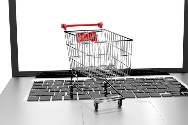 Online Shopping Concept with Mini Shopping Cart on Laptop Keyboard on Transparent Background - Download Free Stock Videos Pikwizard.com