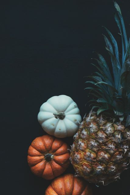 Pineapple Beside Pumpkin - Download Free Stock Photos Pikwizard.com