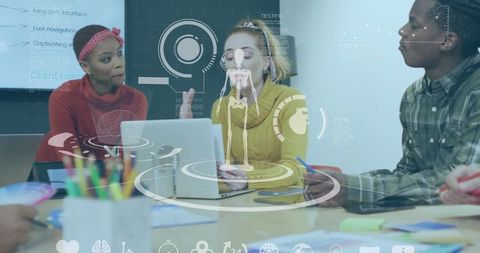 Team collaborating on ui mockups with futuristic holographic overlays