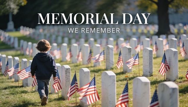 Child walking through military cemetery lined with american flags for memorial day tribute
