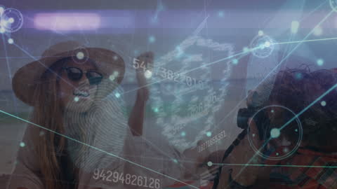 Digital Overlay on Couple Relaxing at Beach