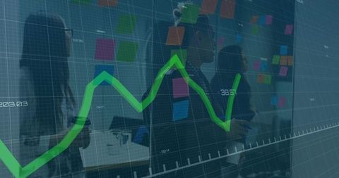 Collaborating Team Brainstorming on Glass Wall with Sticky Notes and Green Data Chart Overlay