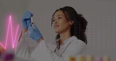 Biomedical Scientist Pipetting with Digital Technology Interface