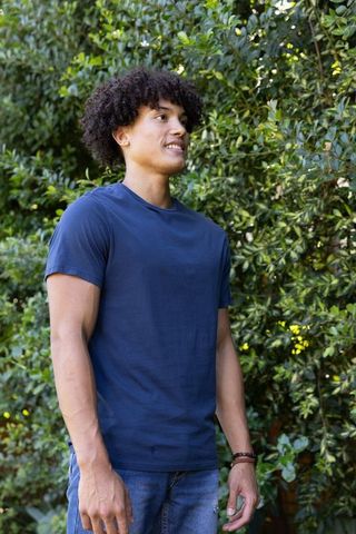 Young Man Enjoys Nature in Casual Attire