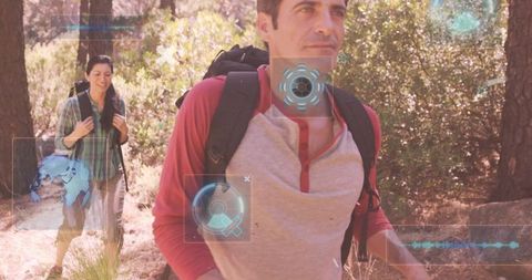 Couple Hiking with Augmented Reality HUD Overlay on Sunlit Pine Trail Outdoor Tech Concept