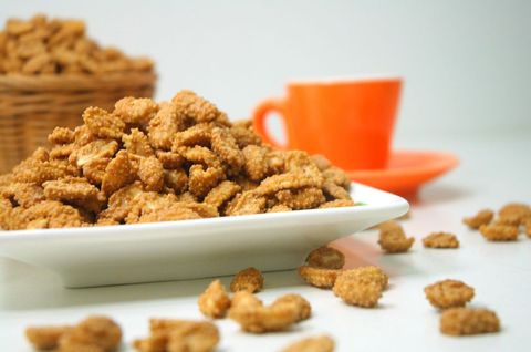 Close-Up of Sweet Caramelized Peanuts on White Square Plate