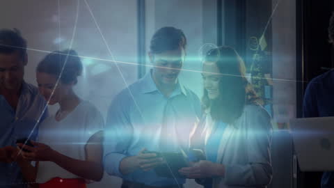 Dynamic Business Team Using Technology in Modern Office