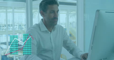 Businessman Analyzing Financial Data on Computer