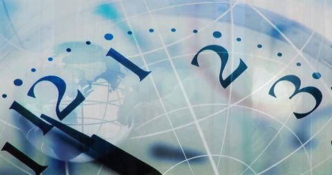Clock hands sweeping past 12 over globe grid showing world time and network