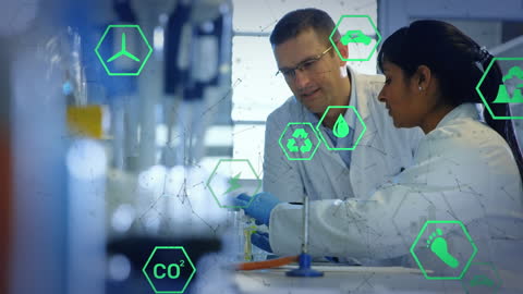 Scientists Analyzing Data in Modern Laboratory Environment