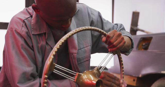 Automotive Technician Repairing Vintage Steering Wheel - Download Free Stock Images Pikwizard.com